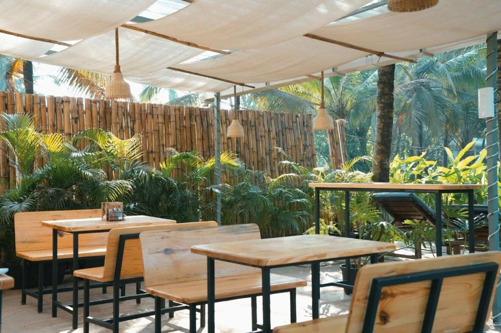 Open-air restaurant seating at North39 in Mandrem